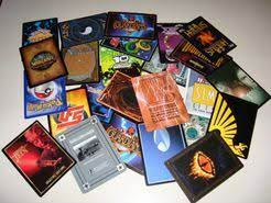 An assortment of trading cards from different games.