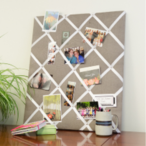 A photo of a fabric bulletin board.