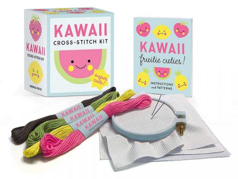 An image of the Kawaii Cross-Stitch kit with an embroidery hoop and thread.