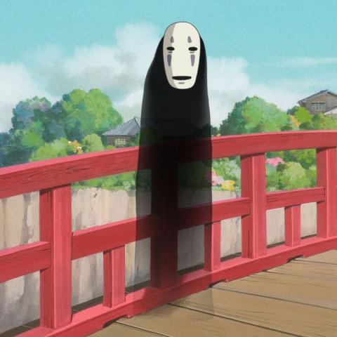 A screenshot of the character No Face from the movie "Spirited Away."