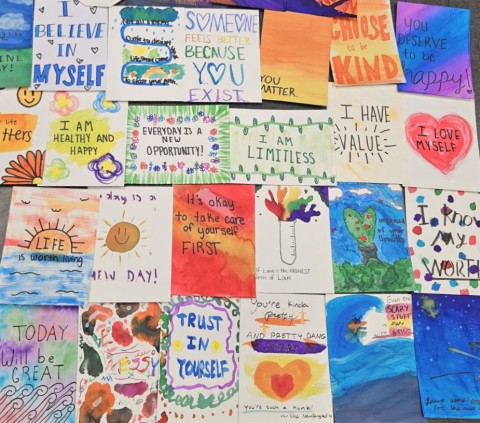 Examples of previous positivity cards made by teen volunteers.