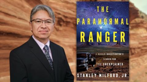 Photo of author with his book called "The Paranormal Ranger."