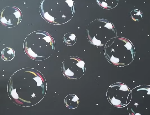 A picture of painted bubbles on a black canvas.