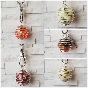 20 sided dice wrapped in wire